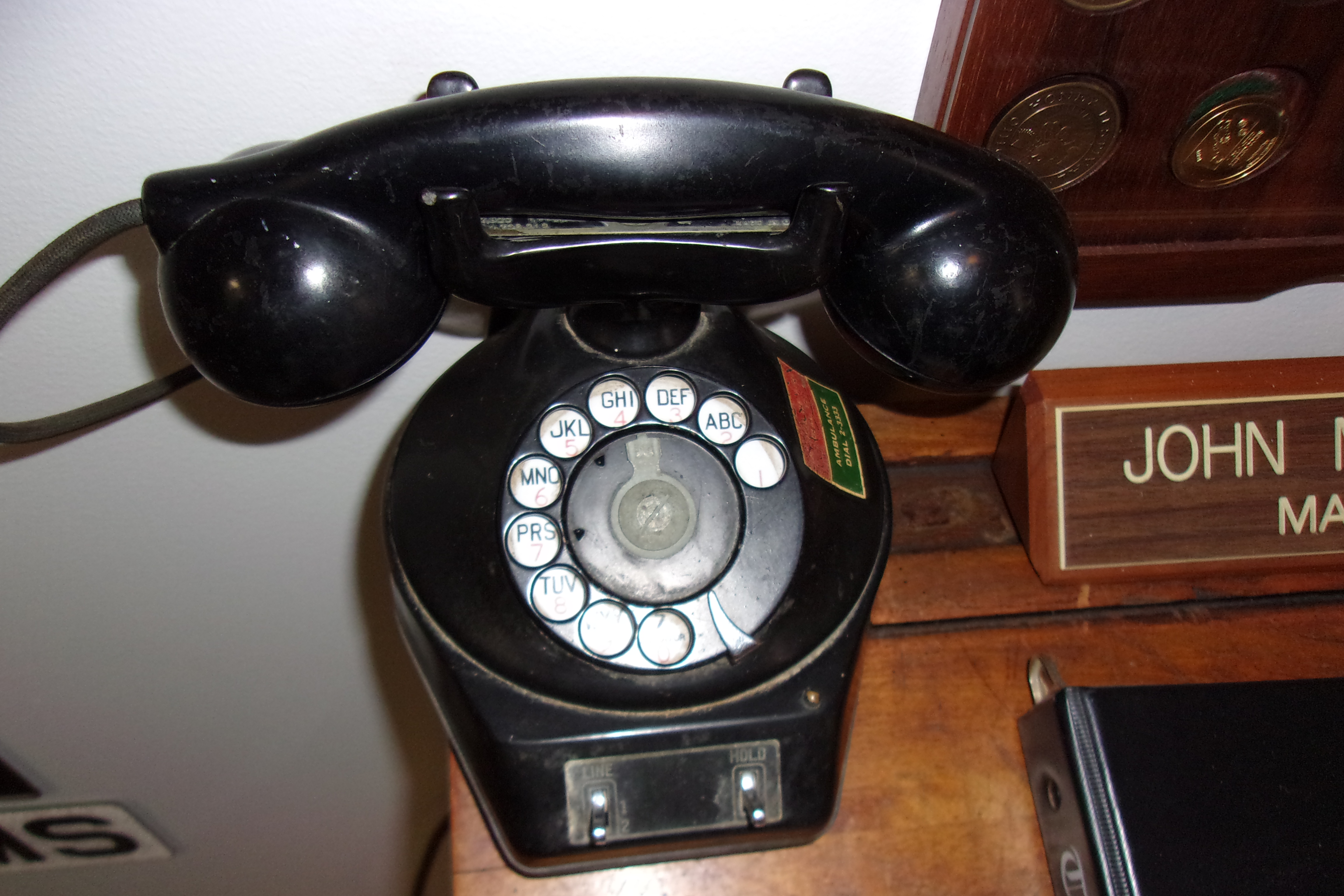 Vintage rotary telephone on John Michael's desk