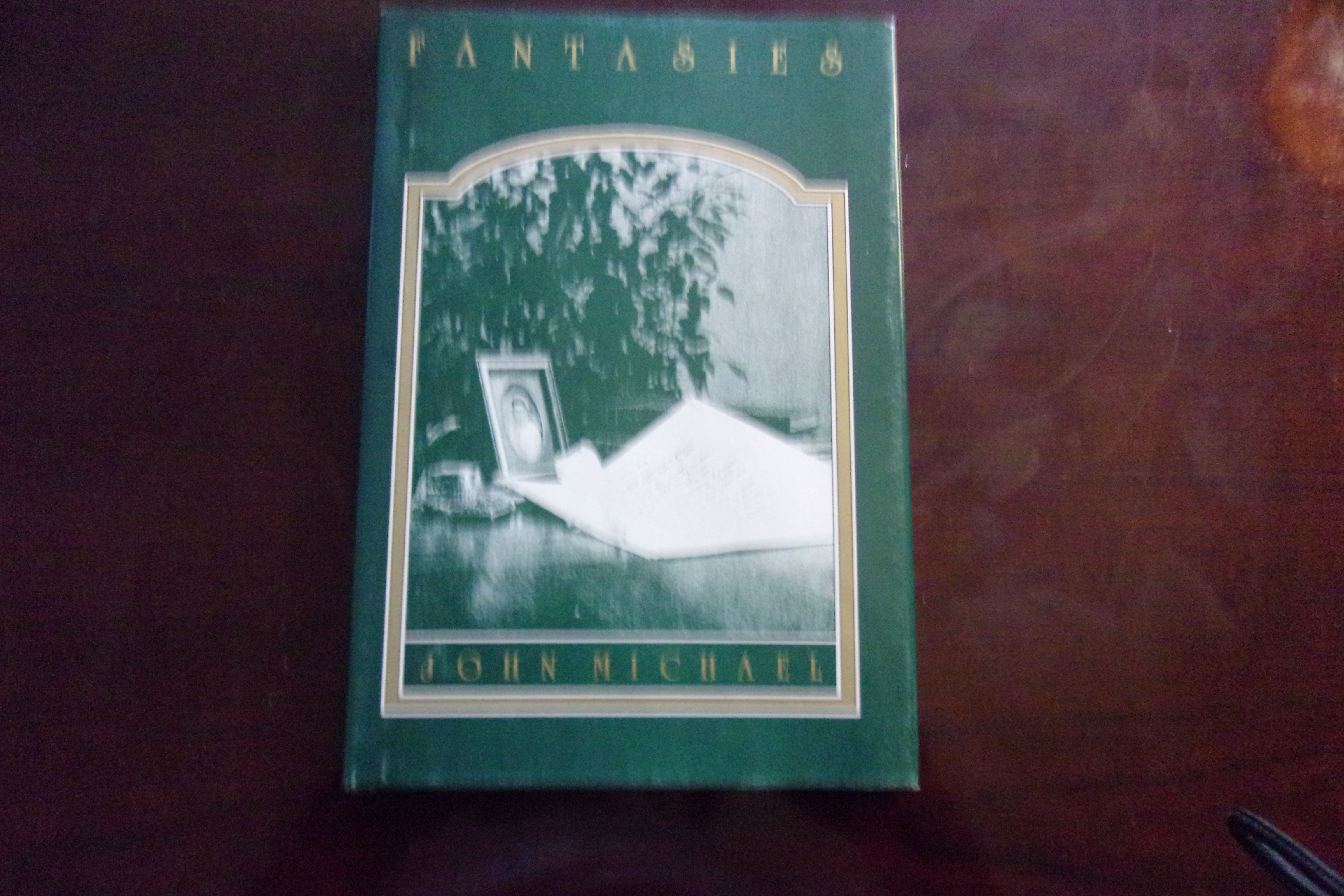 Book cover of Fantasies by John Michael