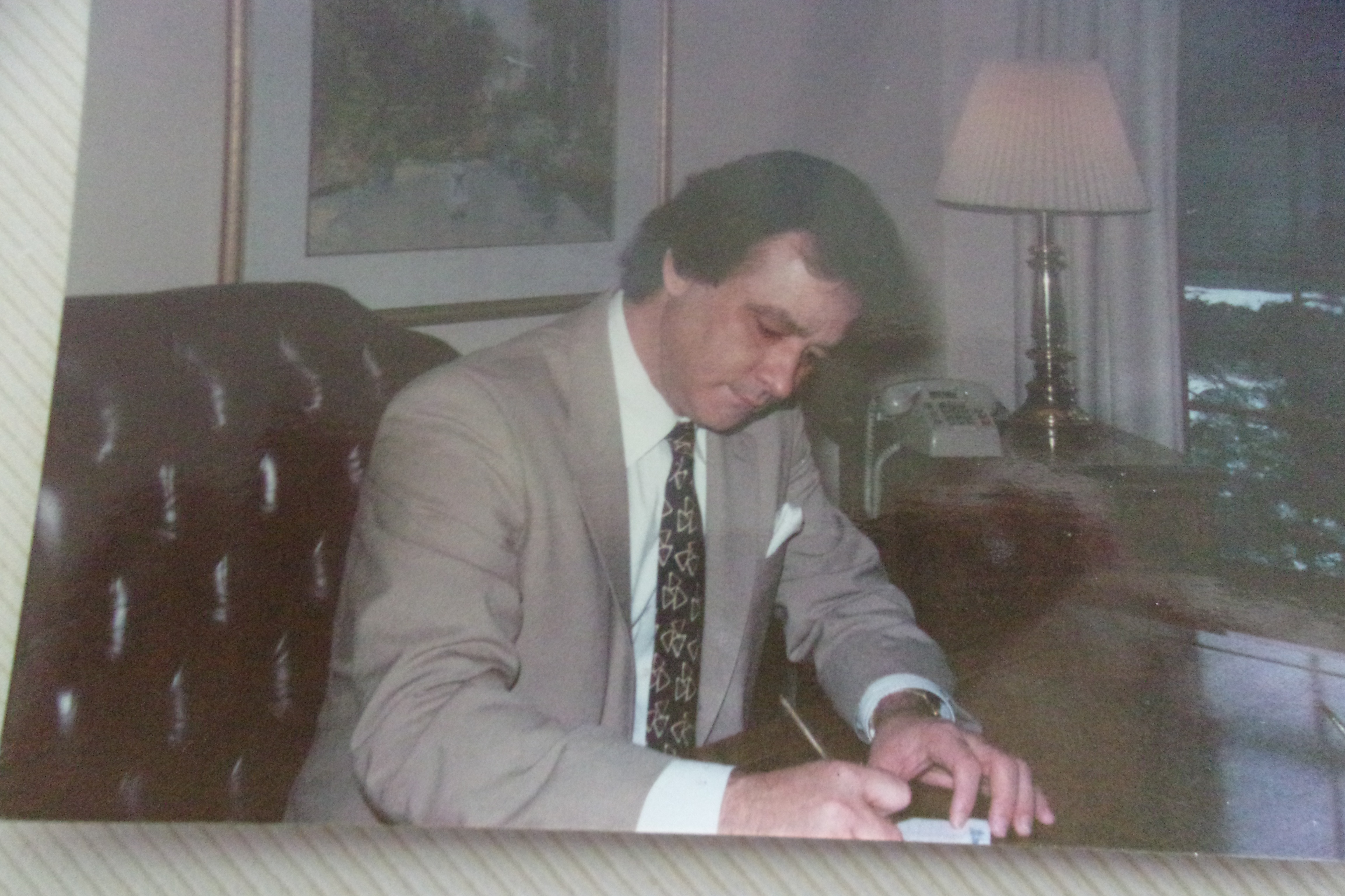 John Michael at his desk